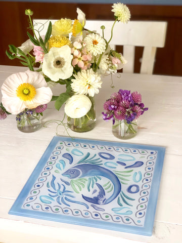 Blue green and white durable tempered glass 12” square cutting board and serving tray made in the USA by Brooks Works Studio.  
